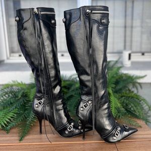 Black skinny heel calf high boot wit cute buttons .